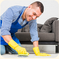 Cleaner deep-cleaning a sofa